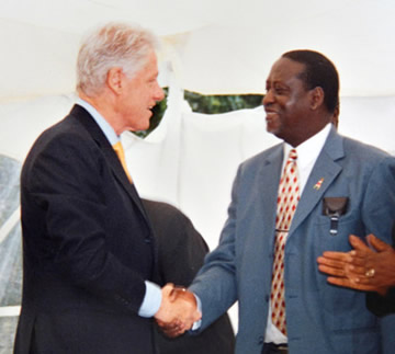 Raila Odinga with former president Bill Clinton